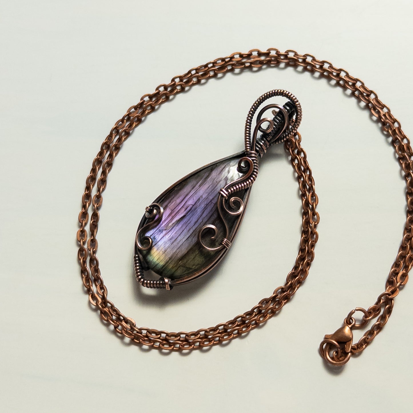 Purple Labradorite with Swirl Design Antiqued Copper Wrapped Pendant