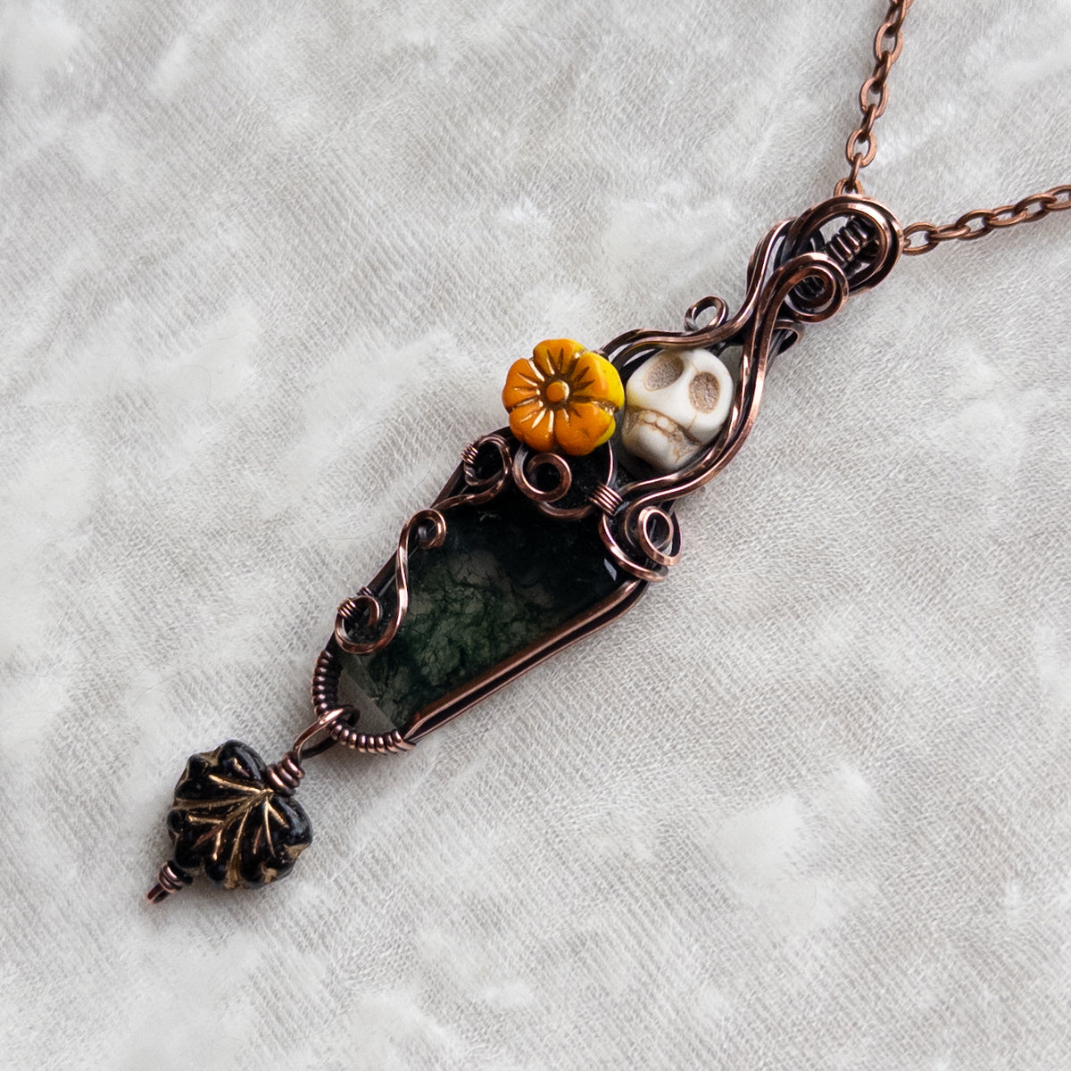 Moss Agate Coffin, Skull, & Marigold Antiqued Copper Pendant With Dangling Czech Glass Leaf
