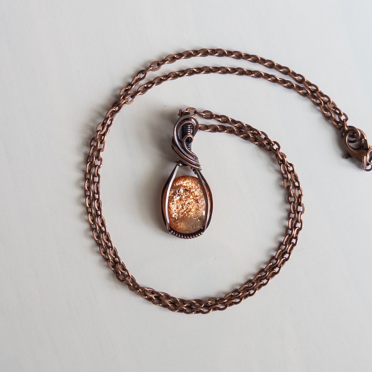 Dainty Sunstone Copper Wrapped Pendant