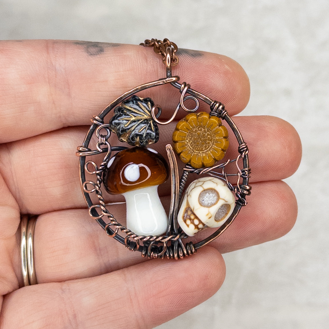 “Autumn Rest” V.2 Antiqued Copper Pendant With Czech Glass Botanical Beads, Lampwork Mushroom Bead, Stone Skull Bead, & Tiny Spiderweb