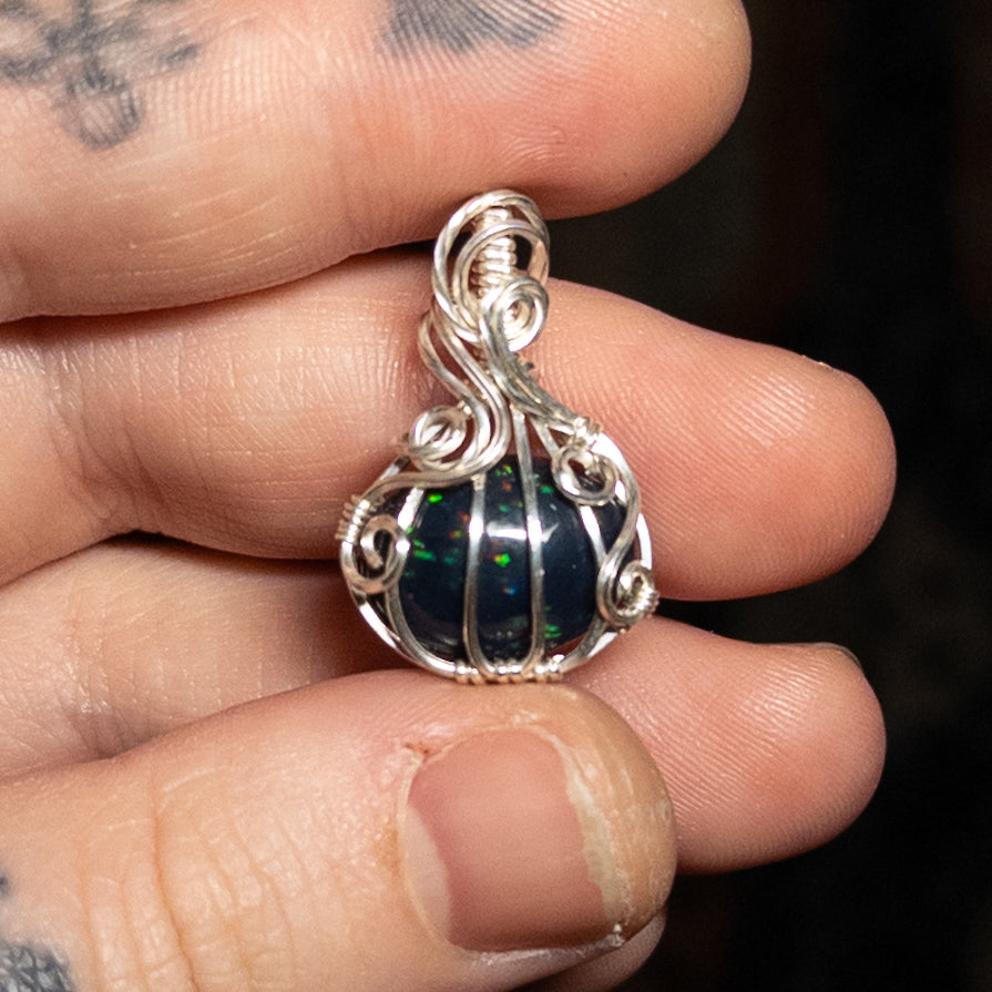4.6 Carat Black Ethiopian Opal Pumpkin Pendant in Solid Sterling Silver
