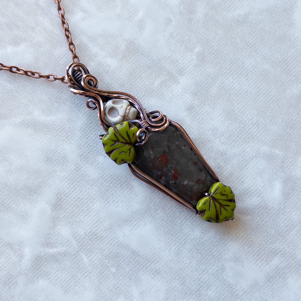 African Bloodstone Coffin & Skull Antiqued Copper Pendant With Czech Glass Leaves