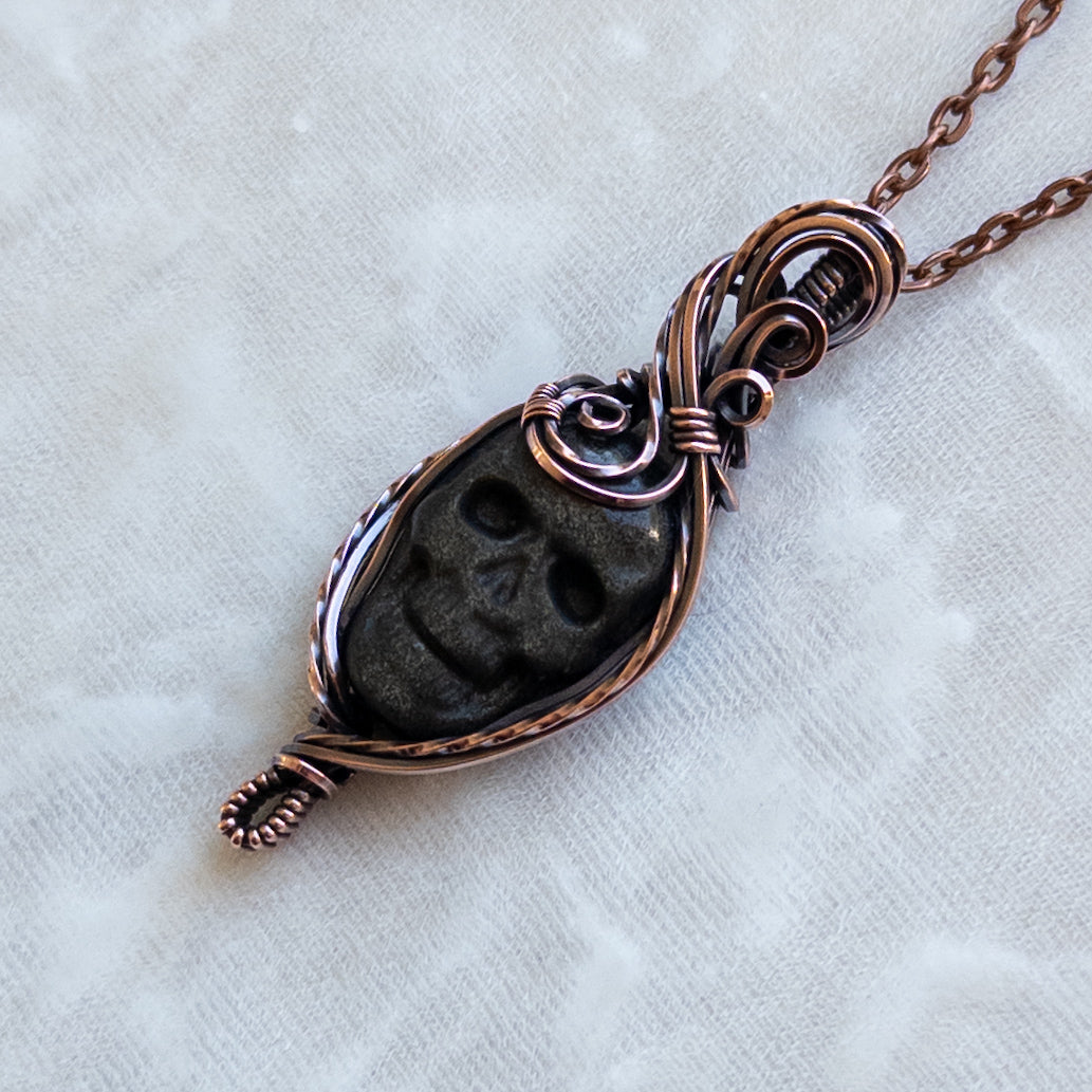 Silver/Gold Sheen Obsidian Skull Antiqued Copper Pendant