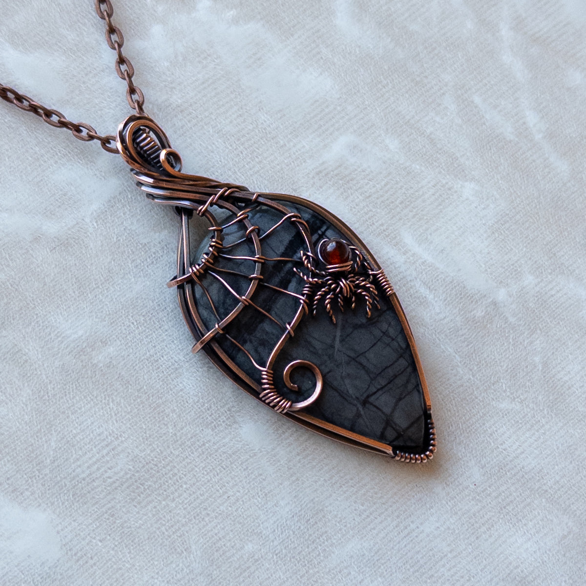 Picasso Jasper With Garnet Spider & Web Antiqued Copper Pendant