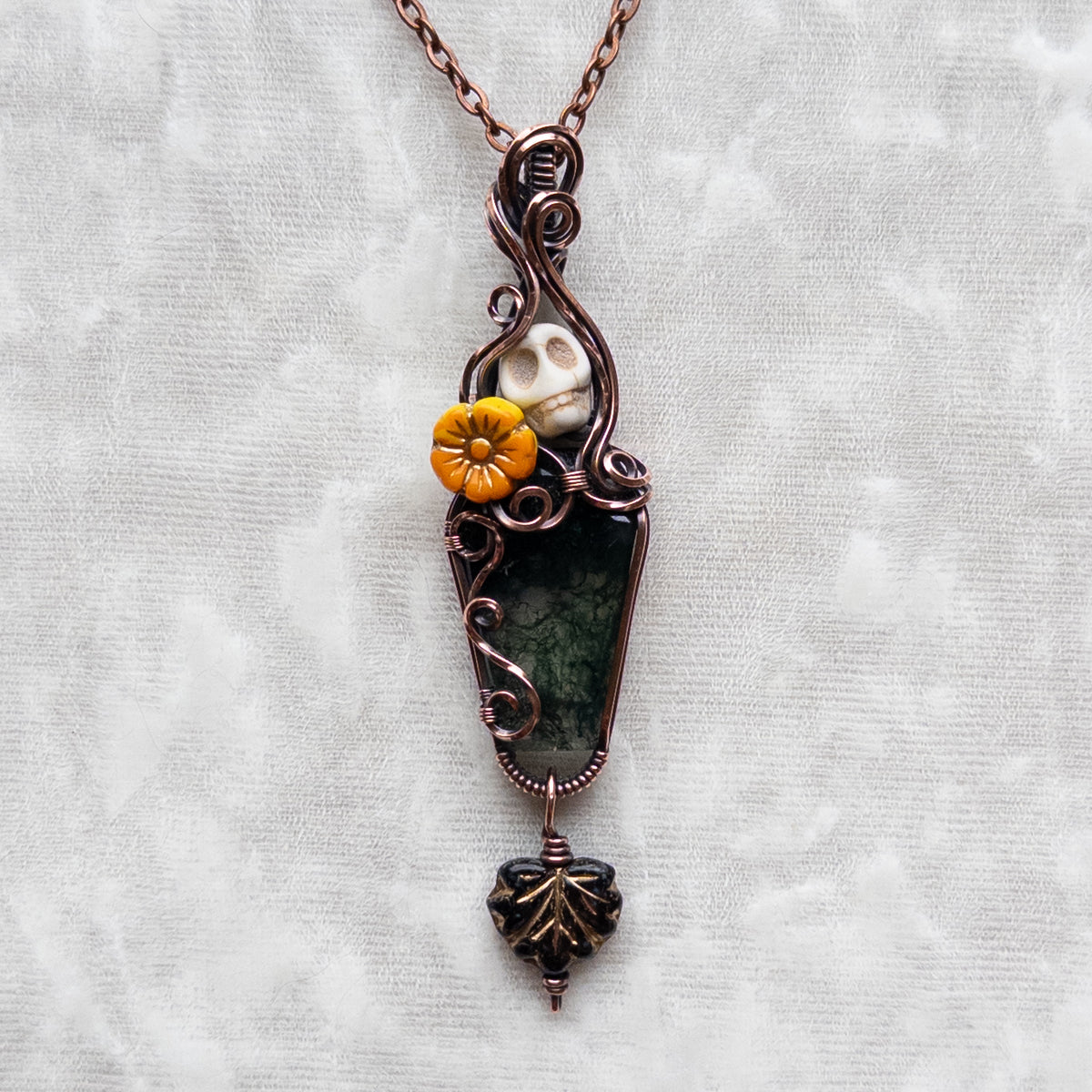 Moss Agate Coffin, Skull, & Marigold Antiqued Copper Pendant With Dangling Czech Glass Leaf