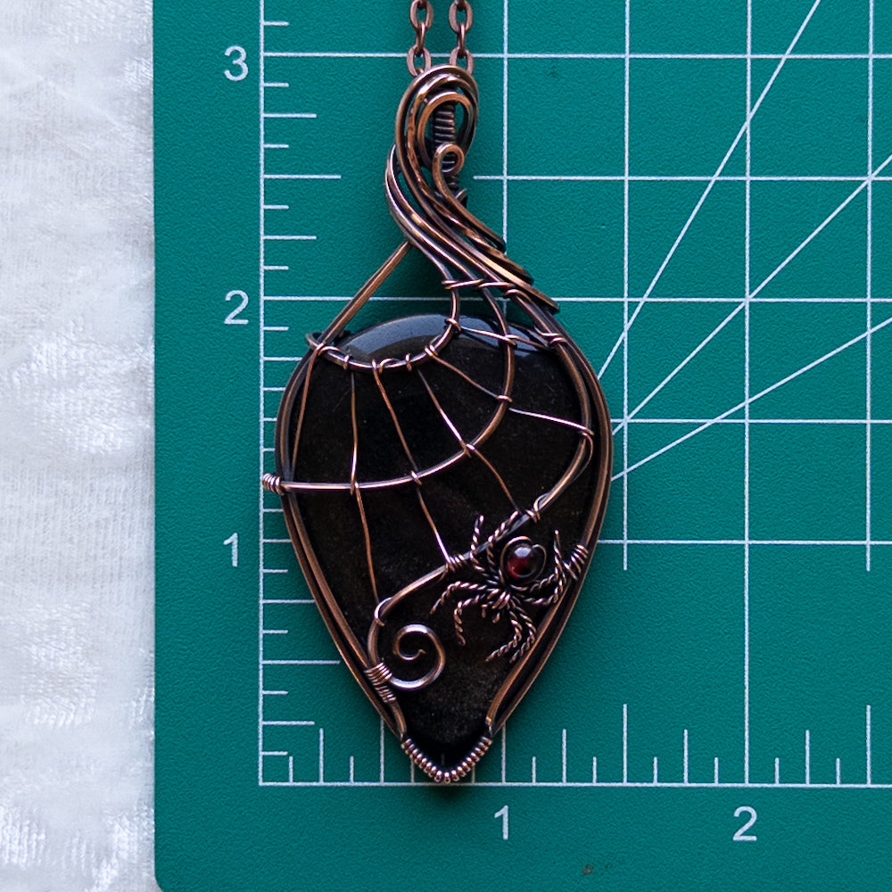 Gold Sheen Obsidian Web & Garnet Spider Pendant - Antiqued Copper