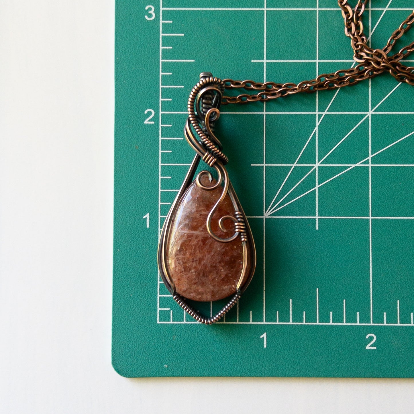 Sunstone & Antiqued Copper Wrapped Pendant