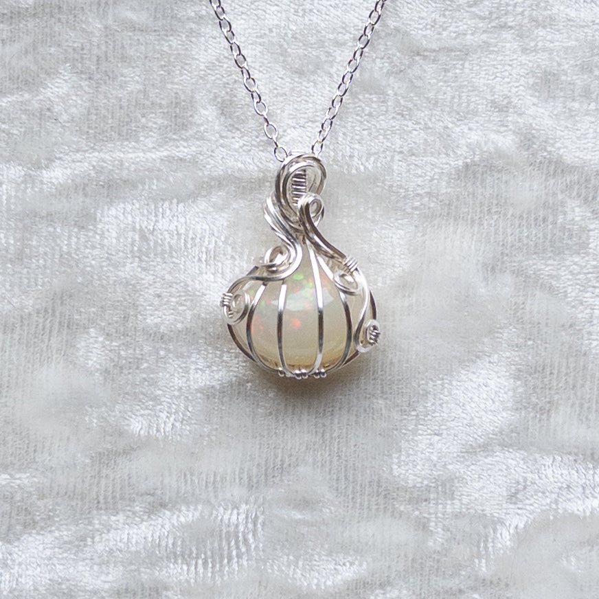 5.6 ct. Ethiopian Opal Pumpkin Pendant - Solid Sterling Silver