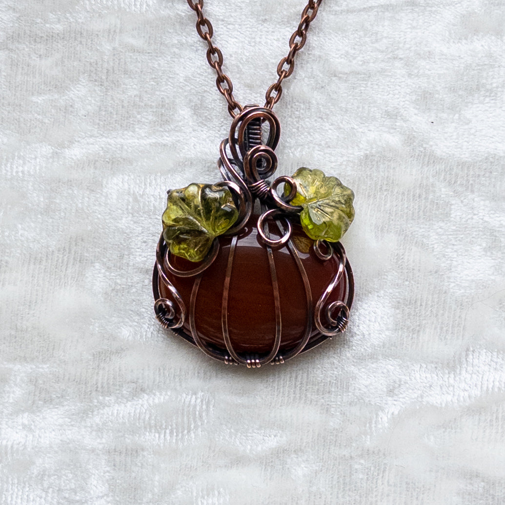 Carnelian Pumpkin Pendant With Czech Glass Leaves - Antiqued Copper