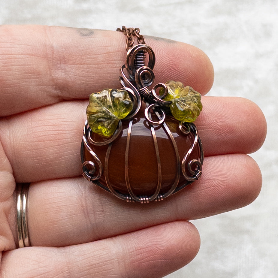 Carnelian Pumpkin Pendant With Czech Glass Leaves - Antiqued Copper