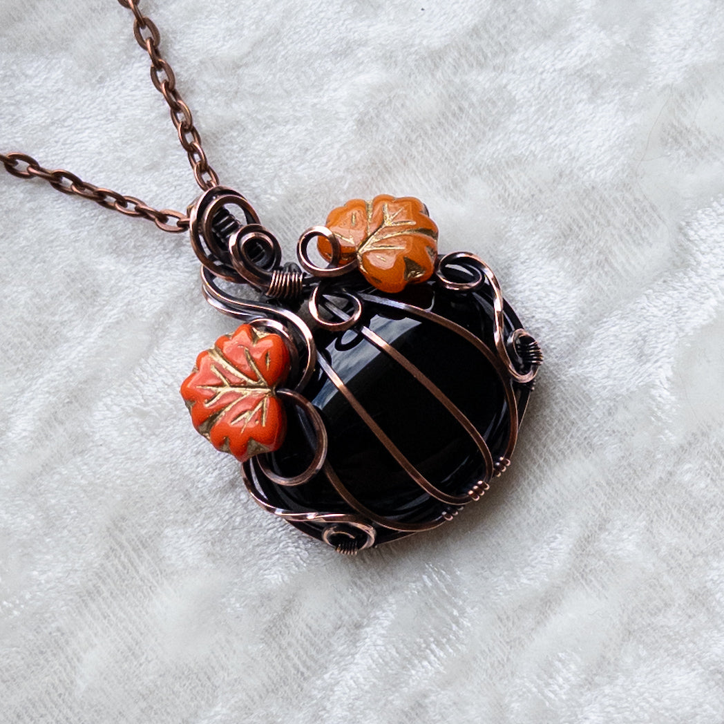 Black Onyx Pumpkin Pendant With Orange Czech Glass Leaves - Antiqued Copper