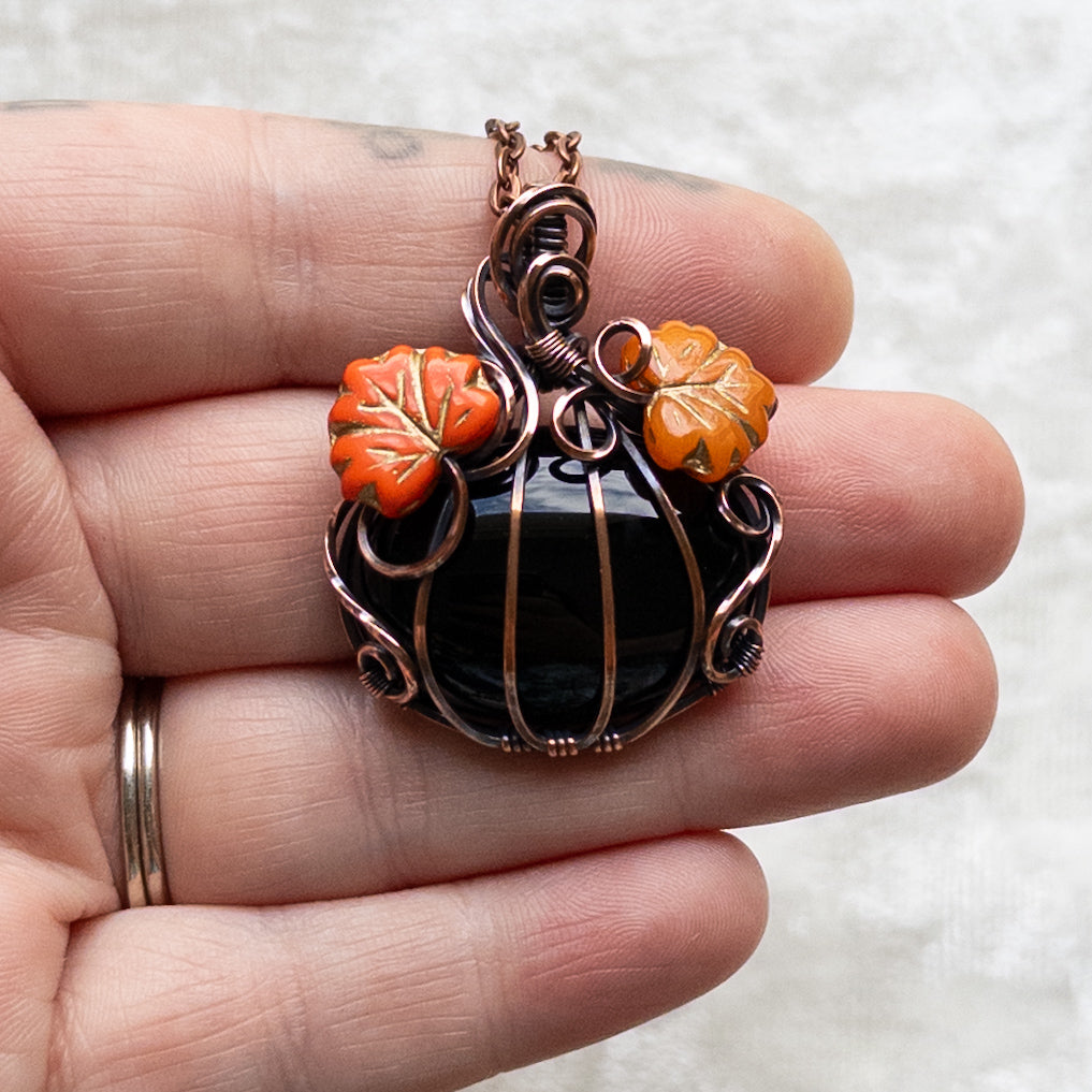 Black Onyx Pumpkin Pendant With Orange Czech Glass Leaves - Antiqued Copper