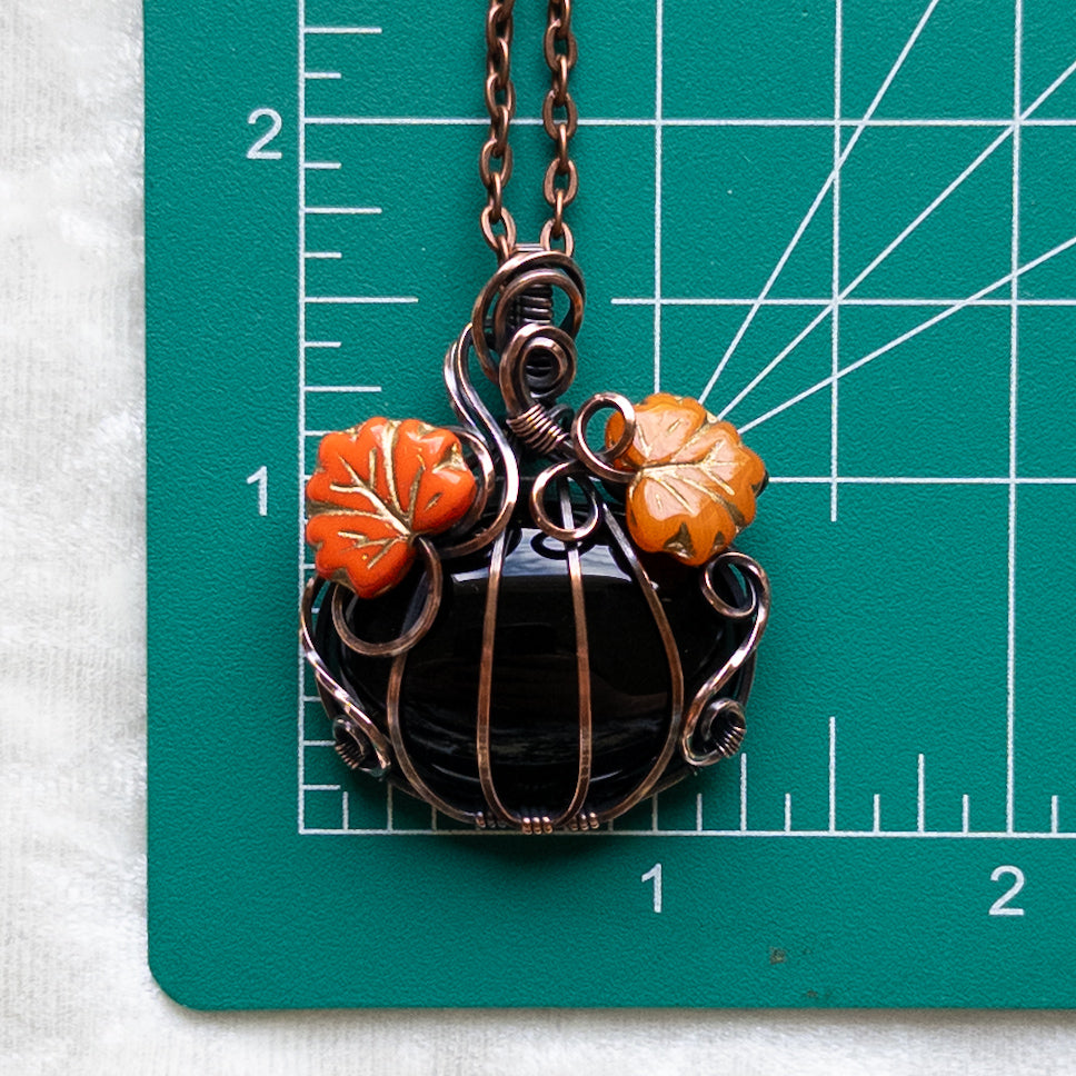 Black Onyx Pumpkin Pendant With Orange Czech Glass Leaves - Antiqued Copper