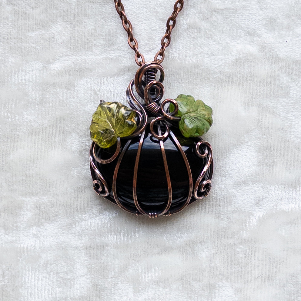 Black Onyx Pumpkin Pendant With Green Czech Glass Leaves - Antiqued Copper