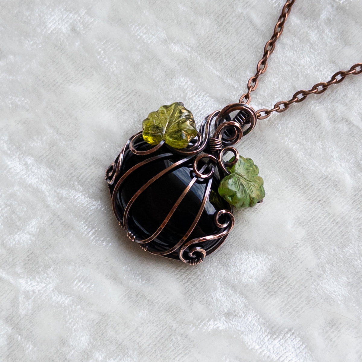 Black Onyx Pumpkin Pendant With Green Czech Glass Leaves - Antiqued Copper