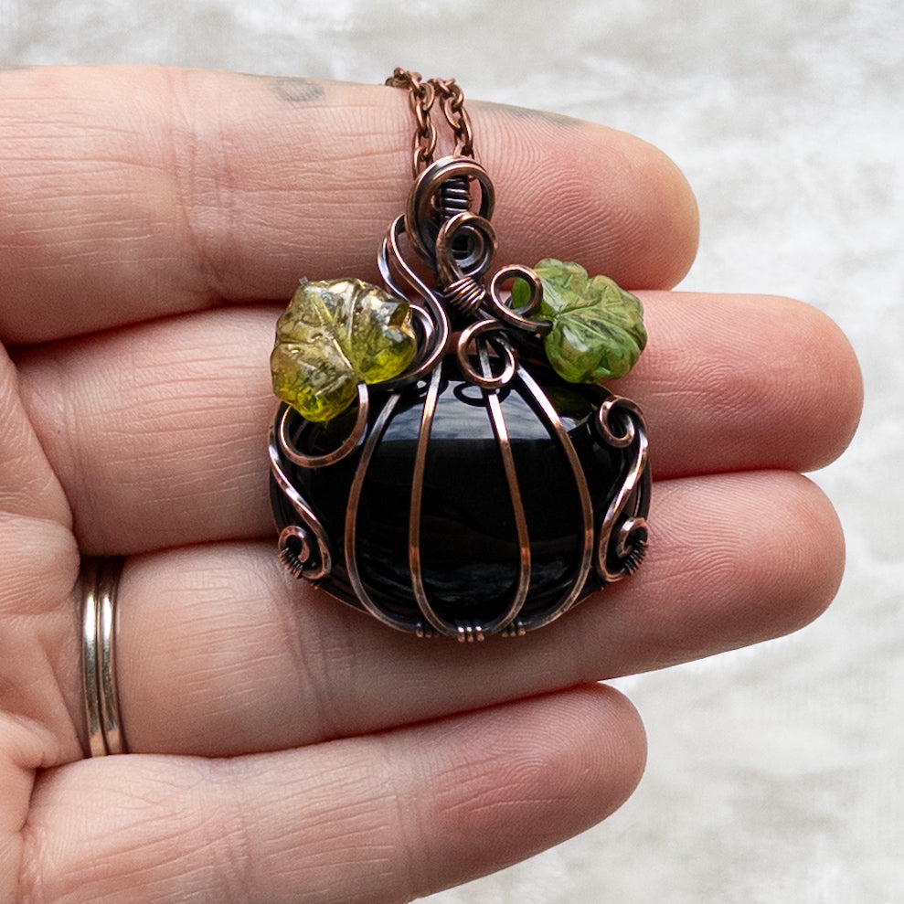 Black Onyx Pumpkin Pendant With Green Czech Glass Leaves - Antiqued Copper
