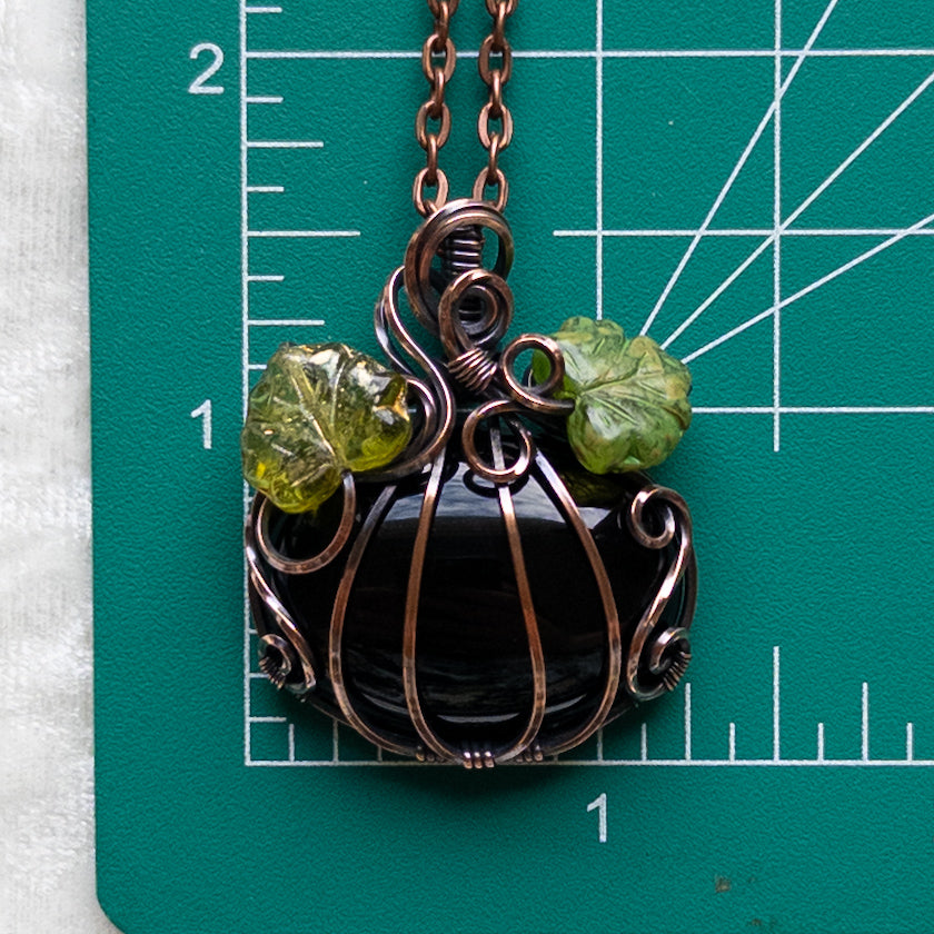 Black Onyx Pumpkin Pendant With Green Czech Glass Leaves - Antiqued Copper