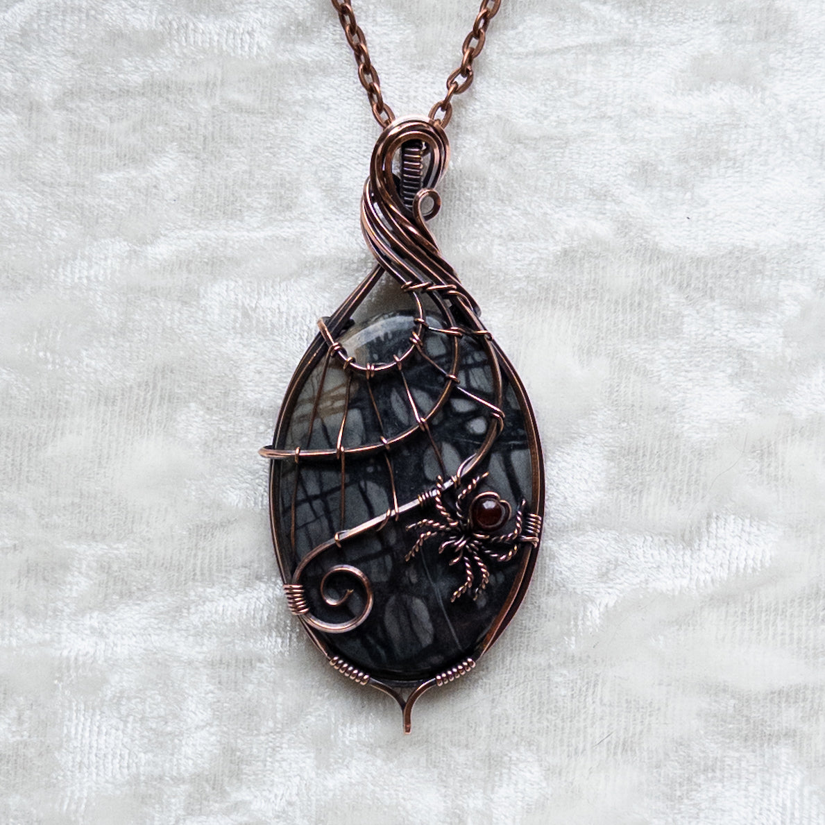 Picasso Jasper With Garnet Spider & Web Pendant - Antiqued Copper
