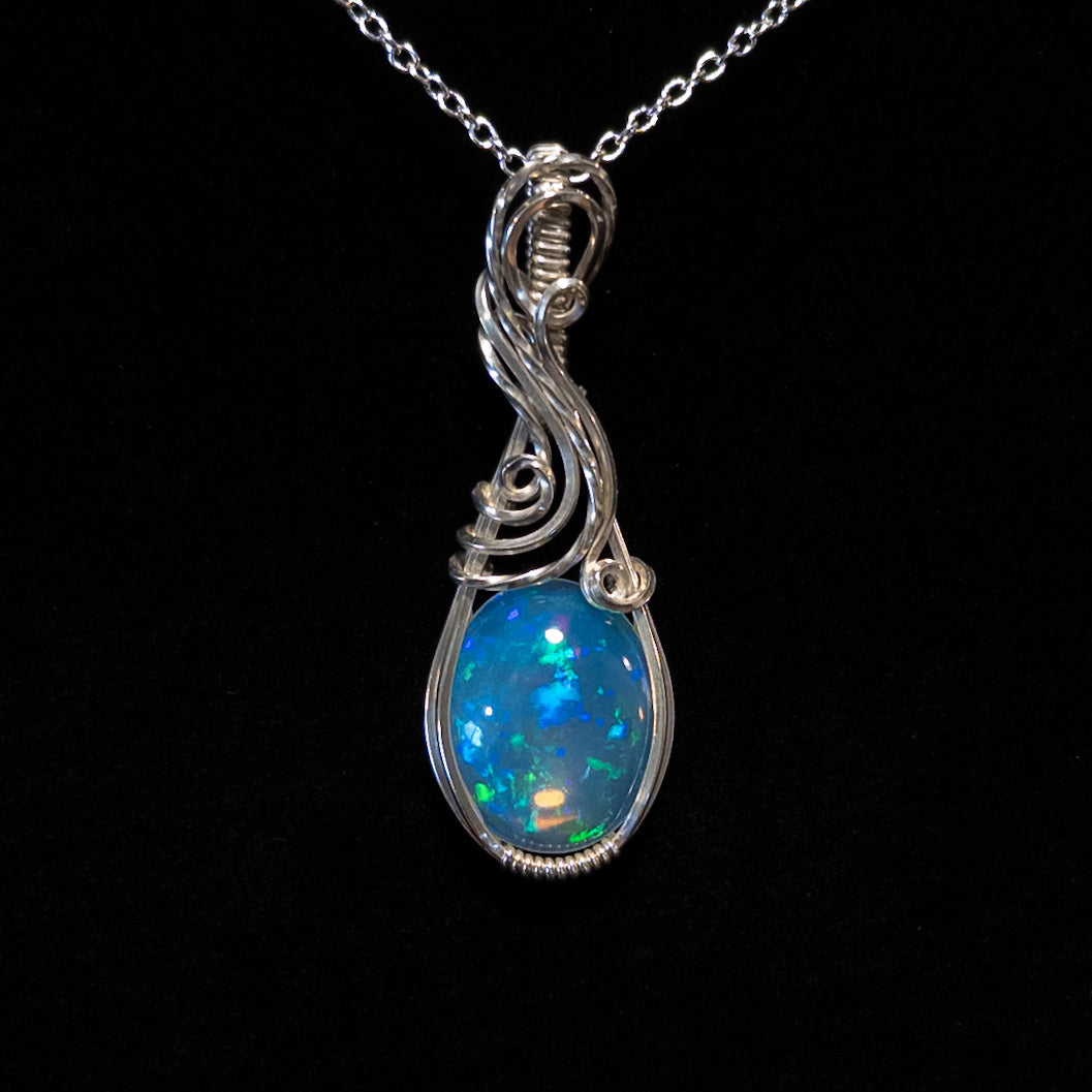 7.8ct. Welo Opal & .925 Sterling Silver Pendant