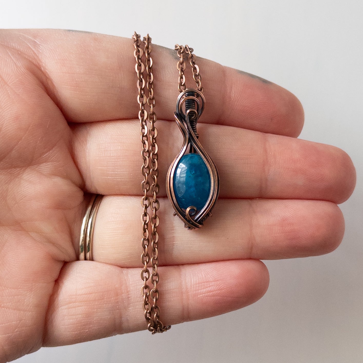 Dainty Blue Apatite Copper Wrapped Pendant