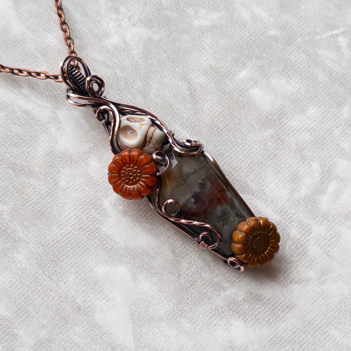 African Bloodstone Coffin, Skull, & Sunflower Antiqued Copper Pendant