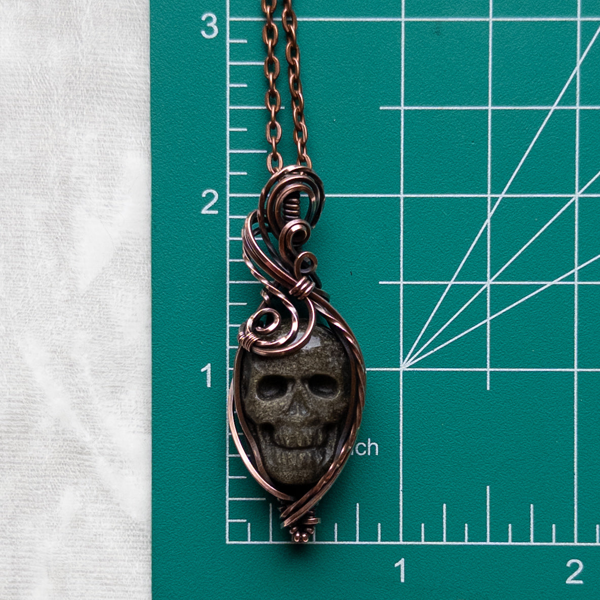 Gold Sheen Obsidian Skull Antiqued Copper Pendant
