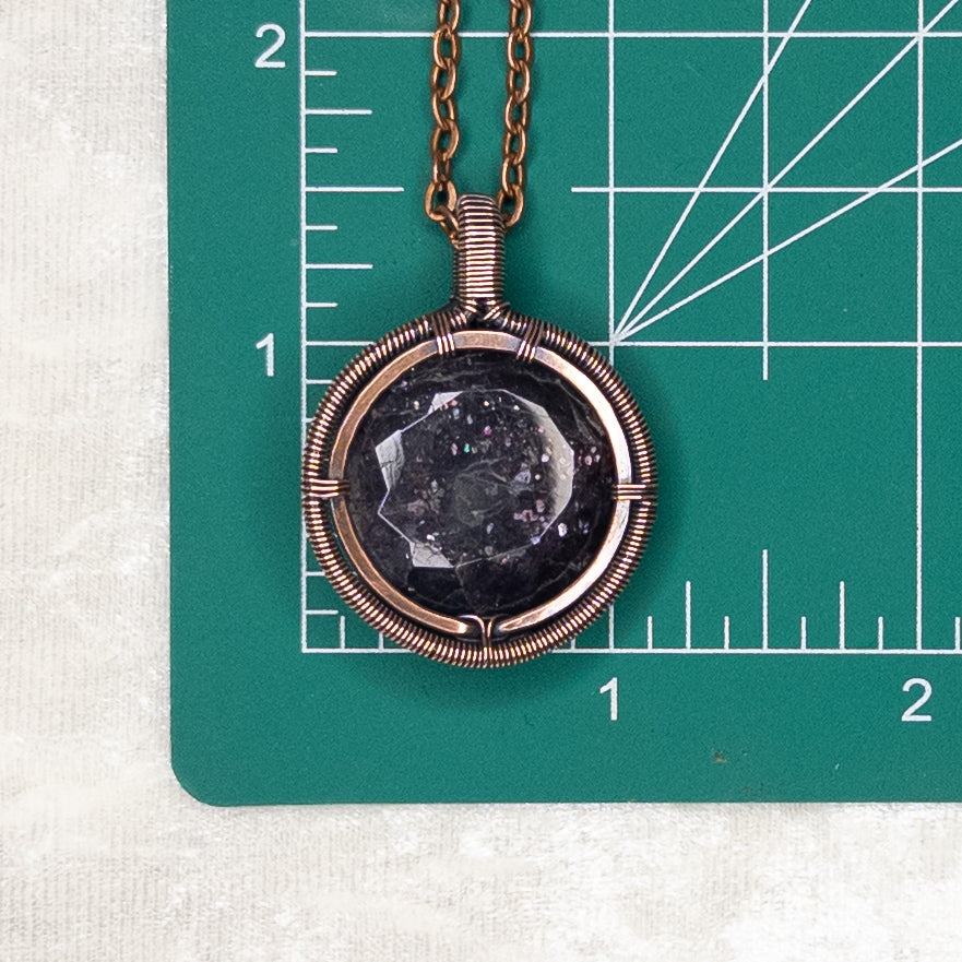 Faceted Bloodshot Iolite Antiqued Copper Medallion Pendant