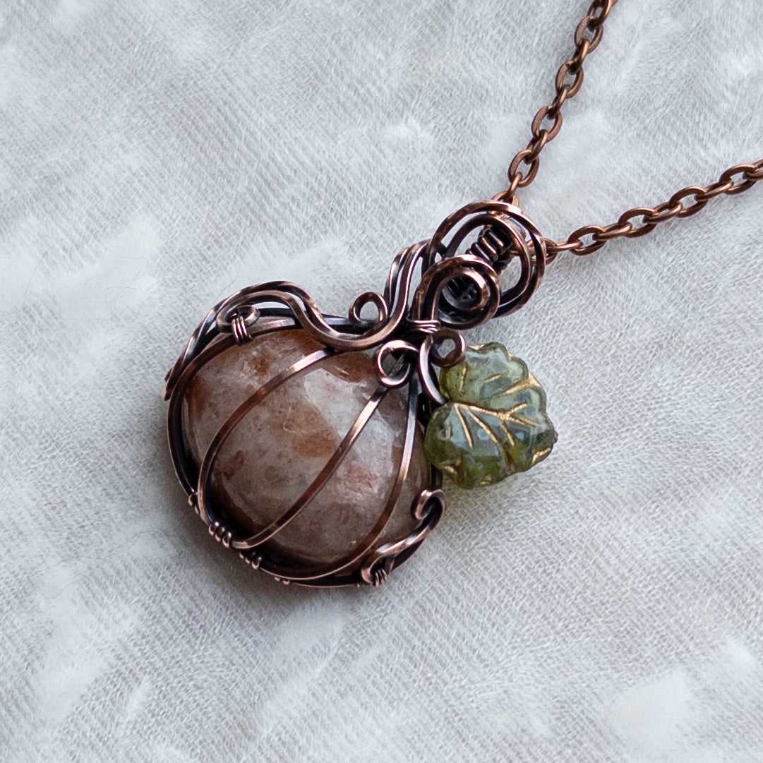 Sunstone Antiqued Copper Pumpkin Pendant With Czech Glass Leaf