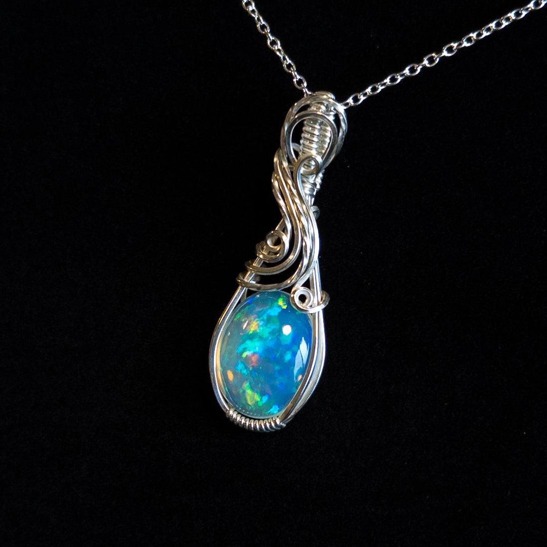 7.8ct. Welo Opal & .925 Sterling Silver Pendant
