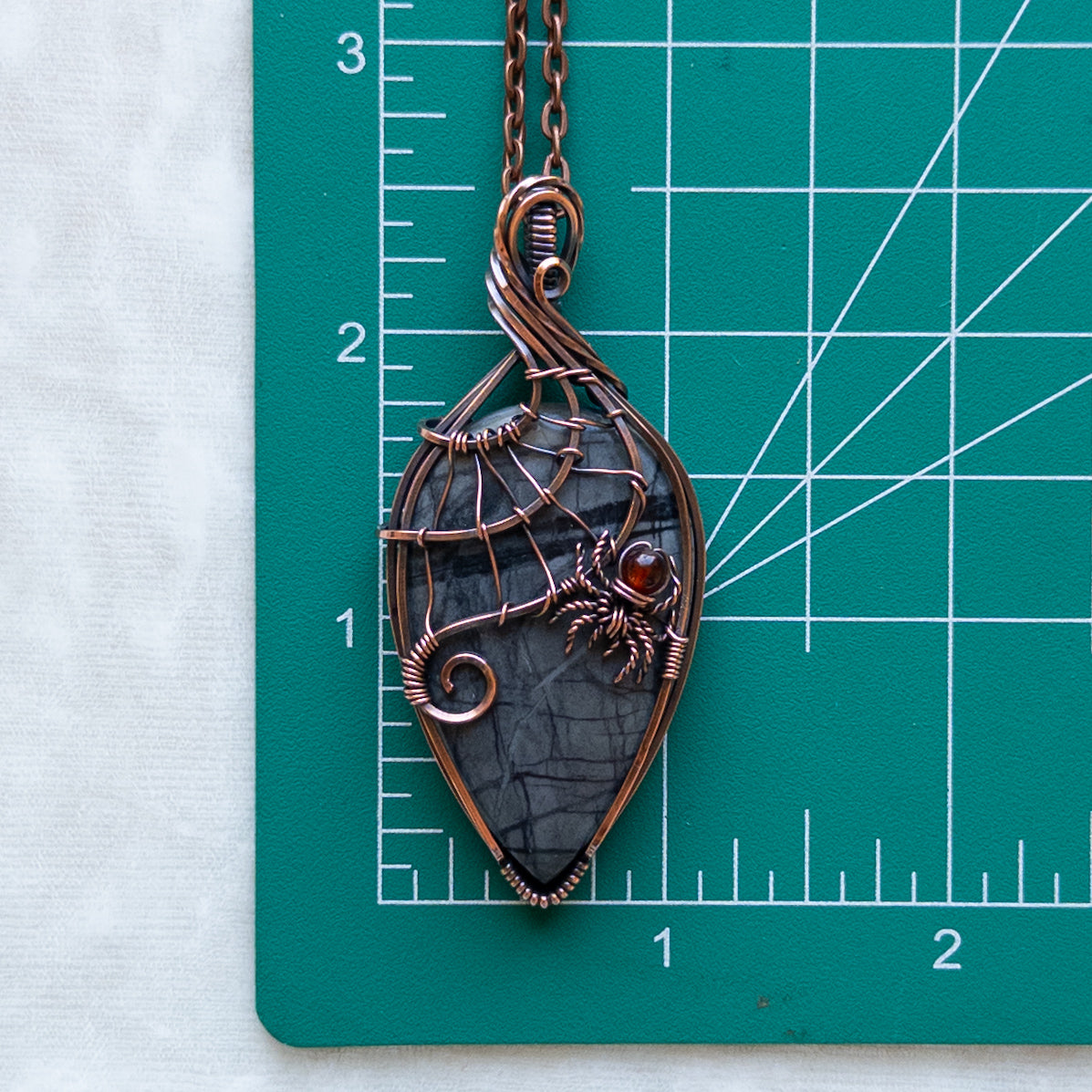 Picasso Jasper With Garnet Spider & Web Antiqued Copper Pendant
