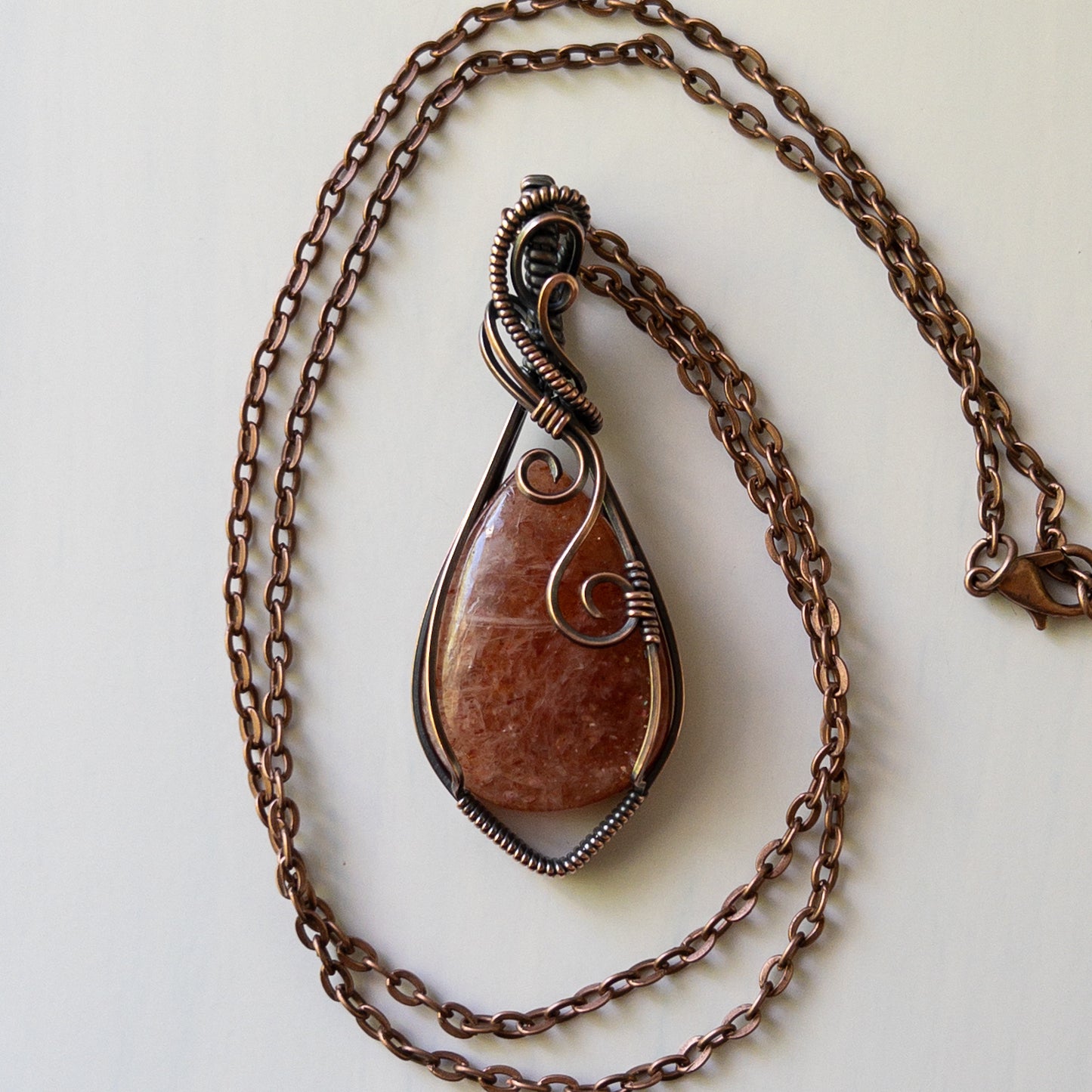 Sunstone & Antiqued Copper Wrapped Pendant