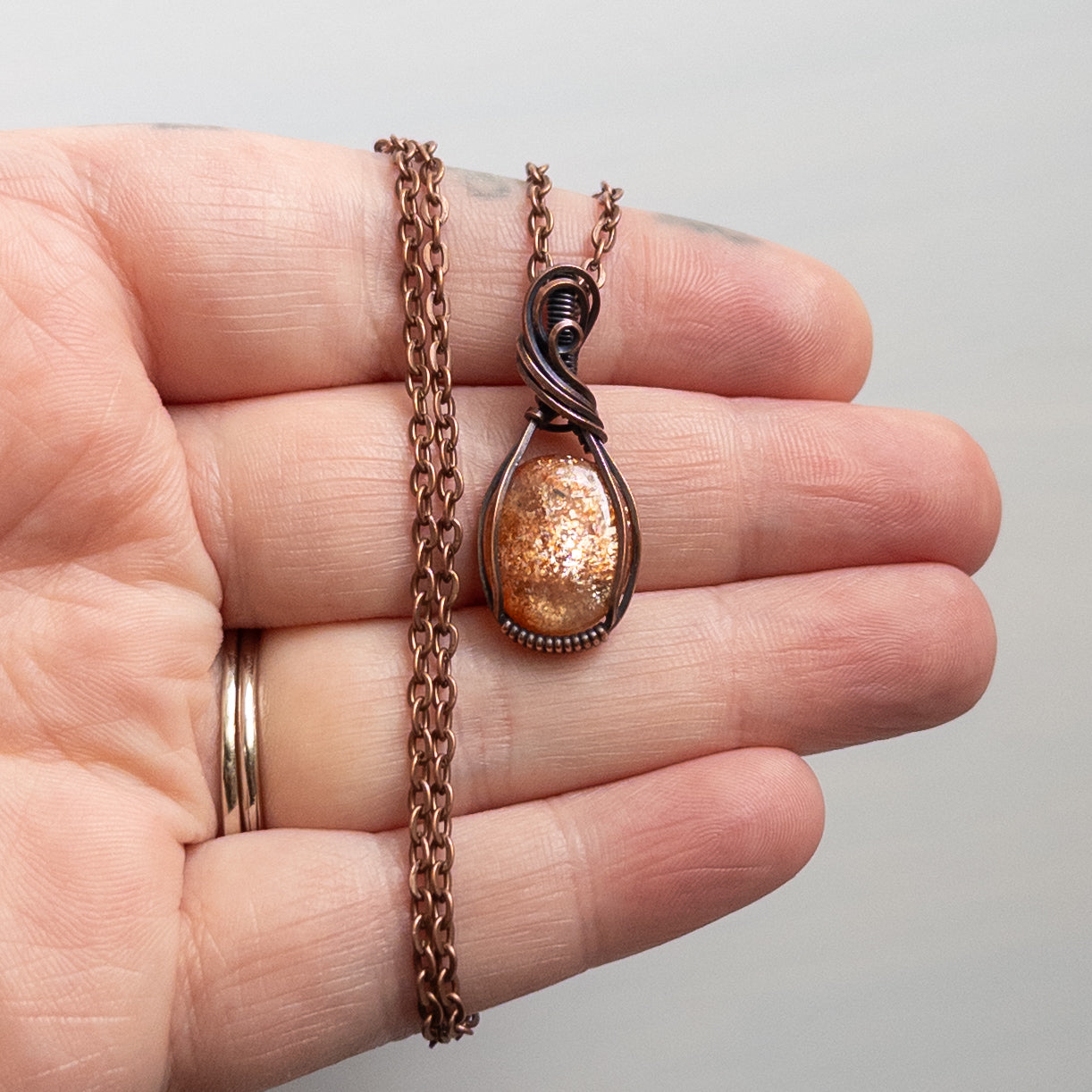 Dainty Sunstone Copper Wrapped Pendant