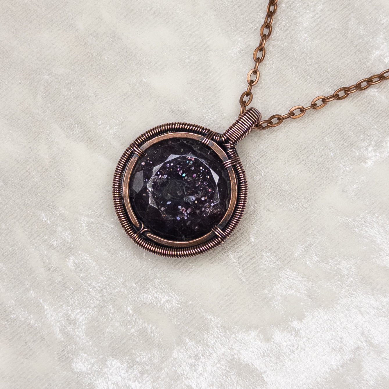 Faceted Bloodshot Iolite Antiqued Copper Medallion Pendant