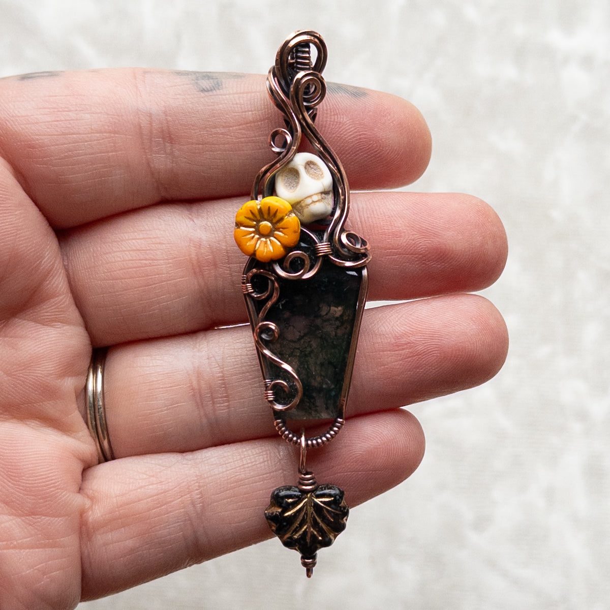 Moss Agate Coffin, Skull, & Marigold Antiqued Copper Pendant With Dangling Czech Glass Leaf