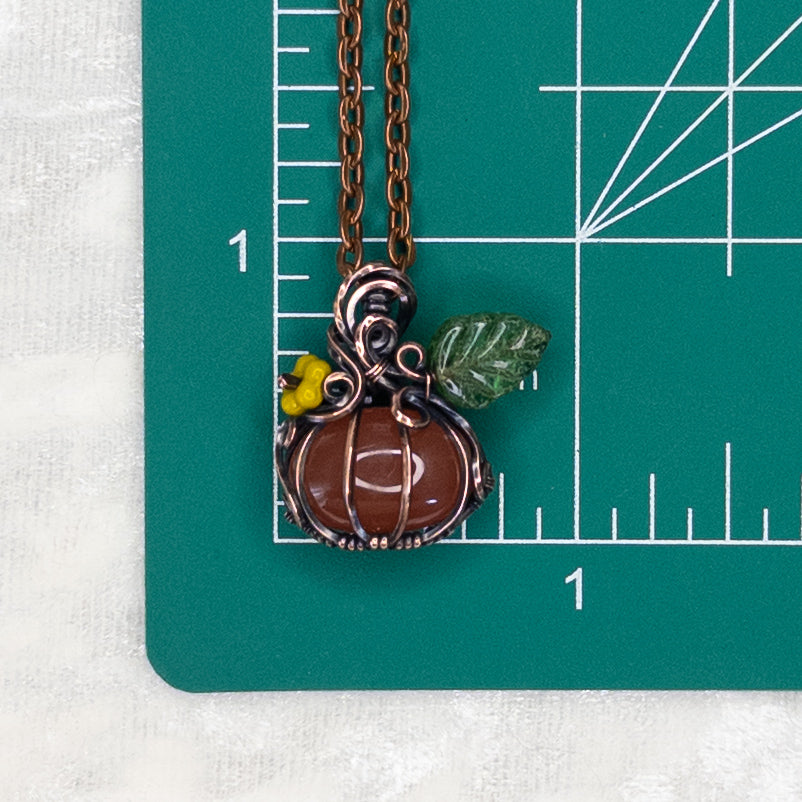 Dainty Carnelian Antiqued Copper Pumpkin Pendant with Czech Glass Blossom & Leaf