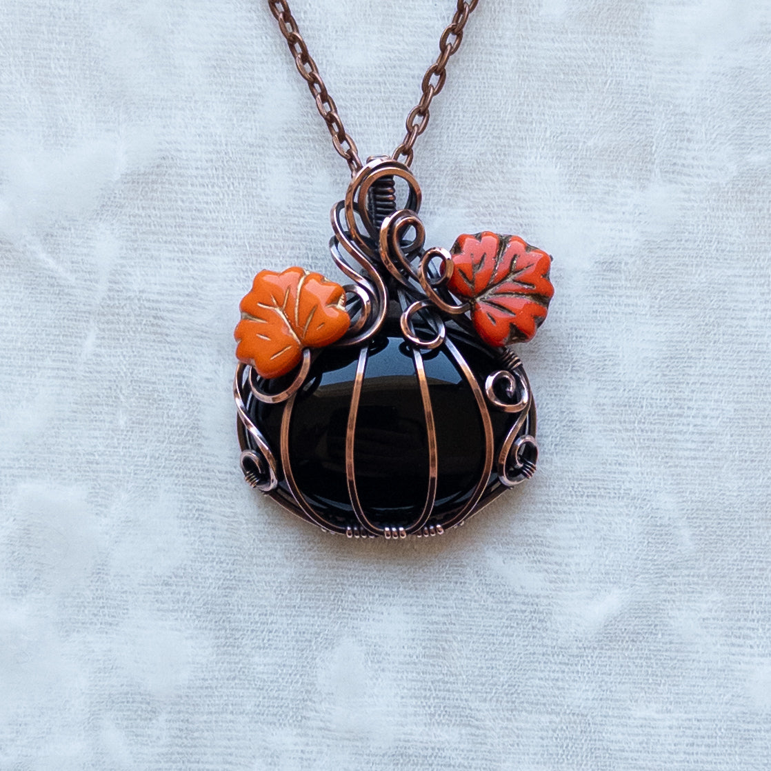 Black Onyx Antiqued Copper Pumpkin Pendant With Orange Leaves