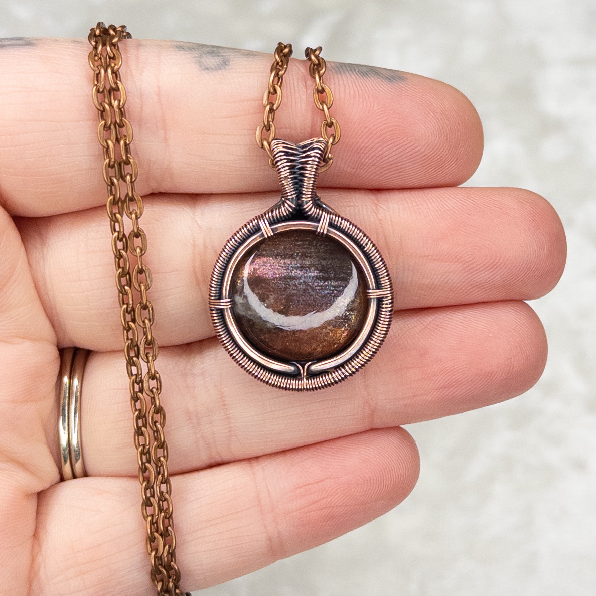 Purple Haze Sunstone Antiqued Copper Medallion Pendant