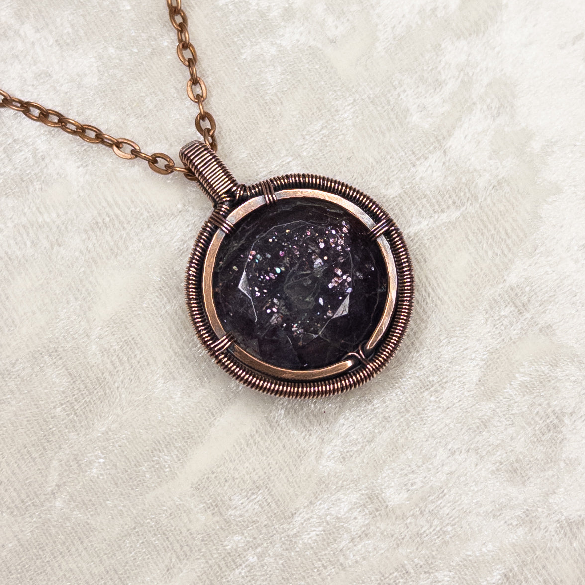Faceted Bloodshot Iolite Antiqued Copper Medallion Pendant