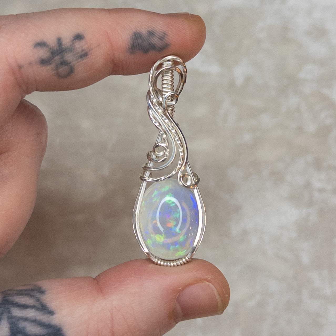 7.8ct. Welo Opal & .925 Sterling Silver Pendant