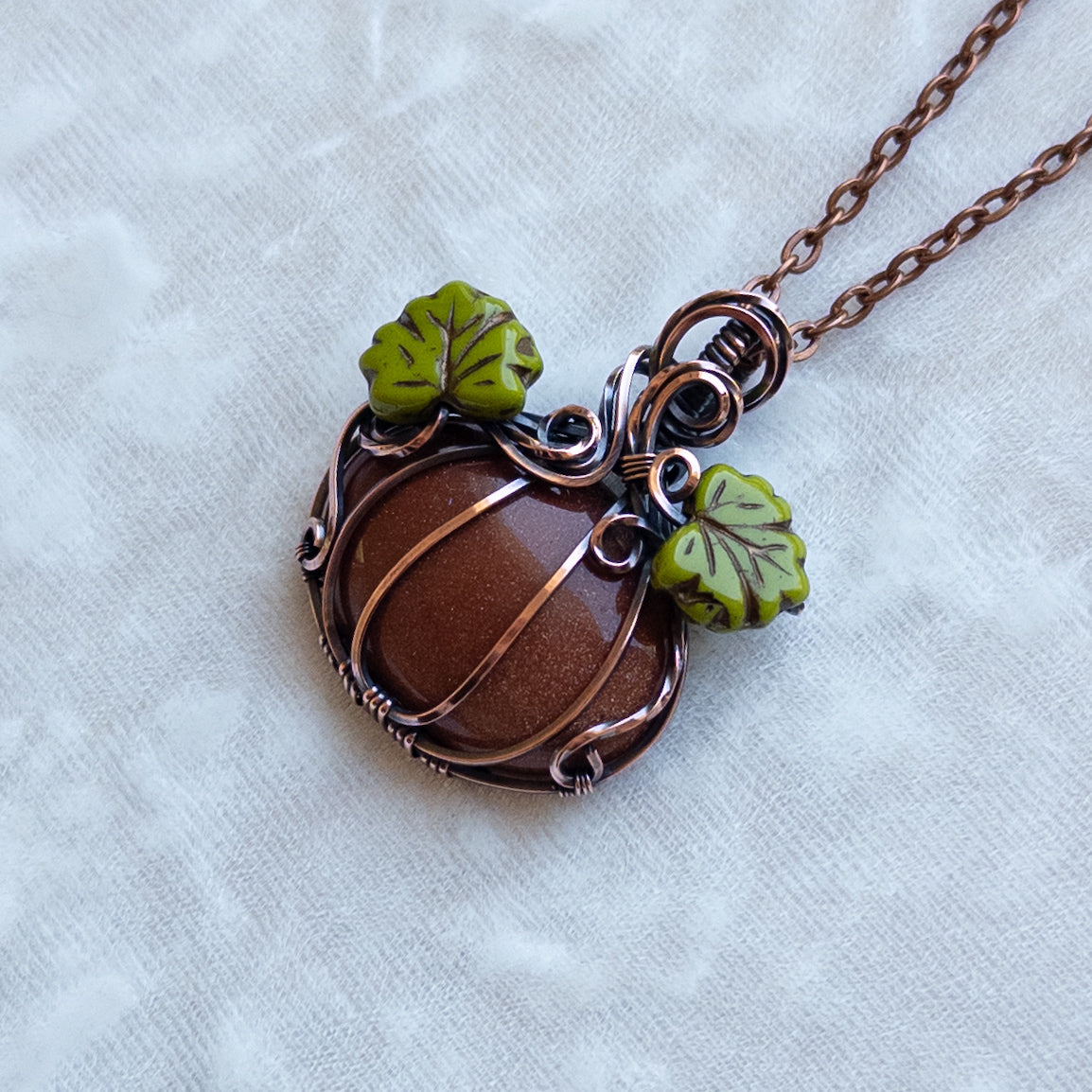Orange Goldstone Antiqued Copper Pumpkin Pendant With Czech Glass Leaves
