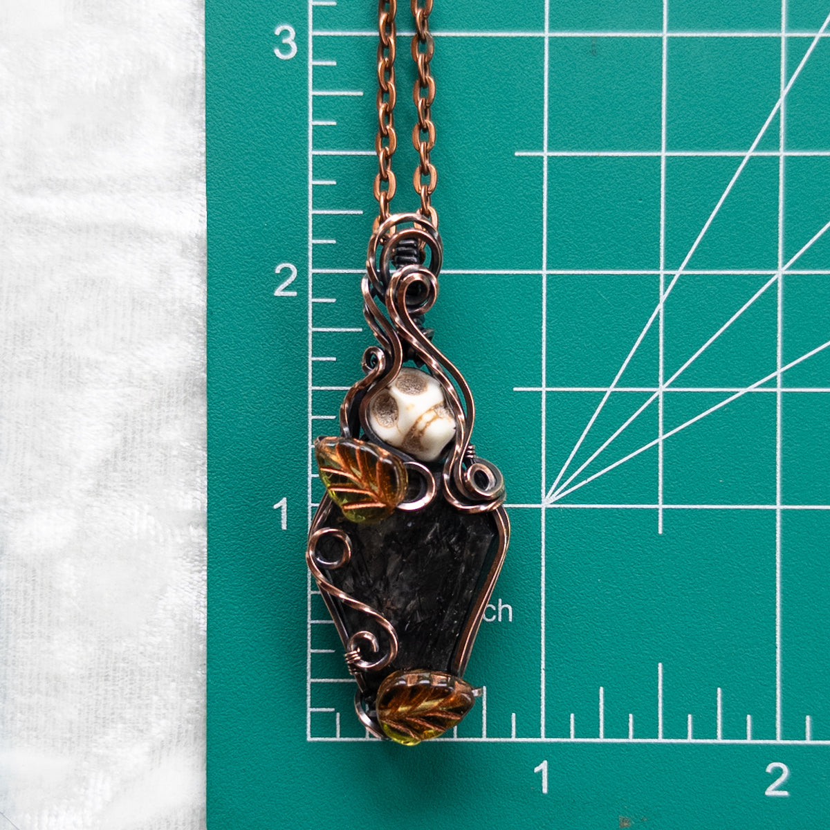 Tourmalinated Quartz Coffin & Skull Antiqued Copper Pendant With Czech Glass Leaves