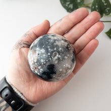 Load image into Gallery viewer, Dyed Black Flower Agate Sphere (2.54 in.)
